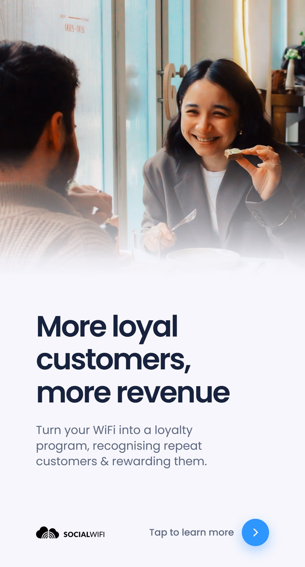 Two people at a cafe table, one smiling and holding a bite of food, with the headline 'More loyal customers, more revenue'