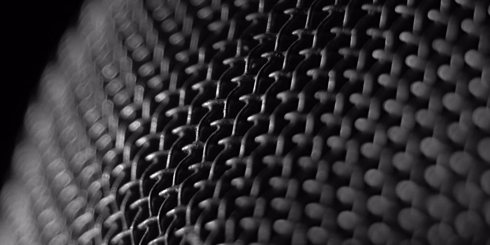 a black microphone mesh